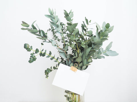 Bouquet of greenery with gift tag