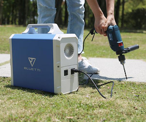 Photo of Bluetti - EB240 2400Wh/1000W Portable Power Station hooked in a power drill.
