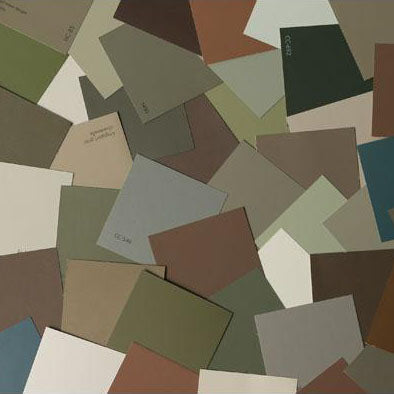 image of multiple earth inspired paint color chips laid out on top of one another