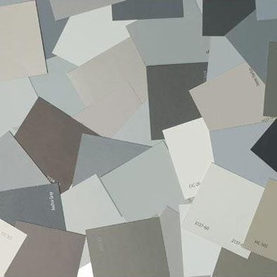 image of multiple gray paint color chips laid out on top of one another