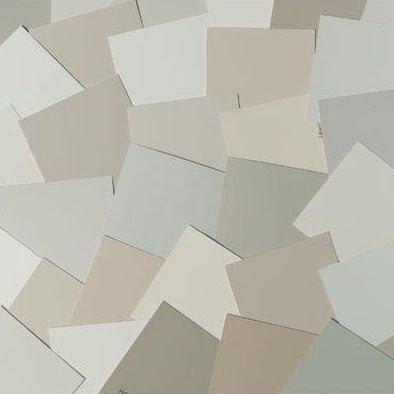image of multiple neutral paint color chips laid out on top of one another
