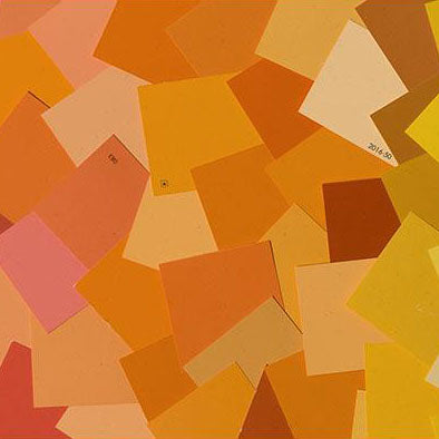 image of multiple organe paint color chips laid out on top of one another
