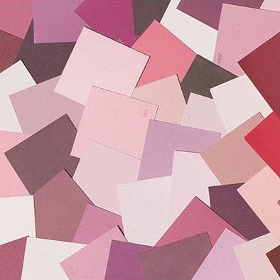 image of multiple pink paint color chips laid out on top of one another