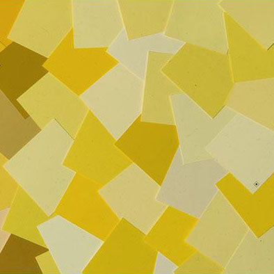 image of multiple yellow paint color chips laid out on top of one another