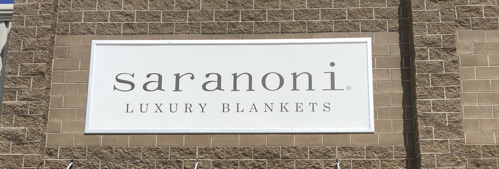 Store front signage for Saranoni Luxury Blankets located at 700 W 1700 S Suite 108 Logan, Utah 84321