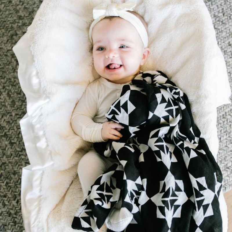 black and white muslin swaddle