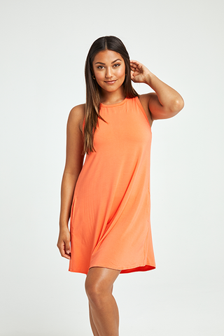 Shebird's tunic style dress with racerback and built in brad - shown here in coral color