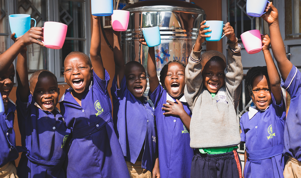 kids with safe drinking water