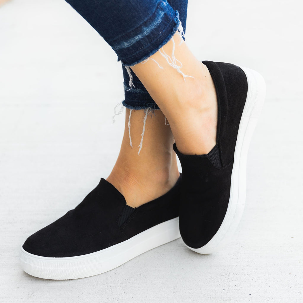 comfortable black slip on sneakers