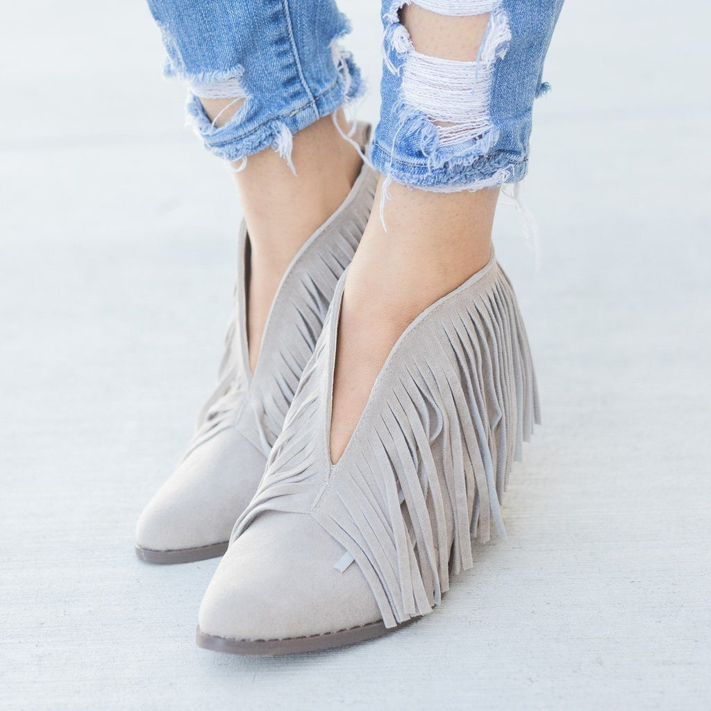 beast fringe booties