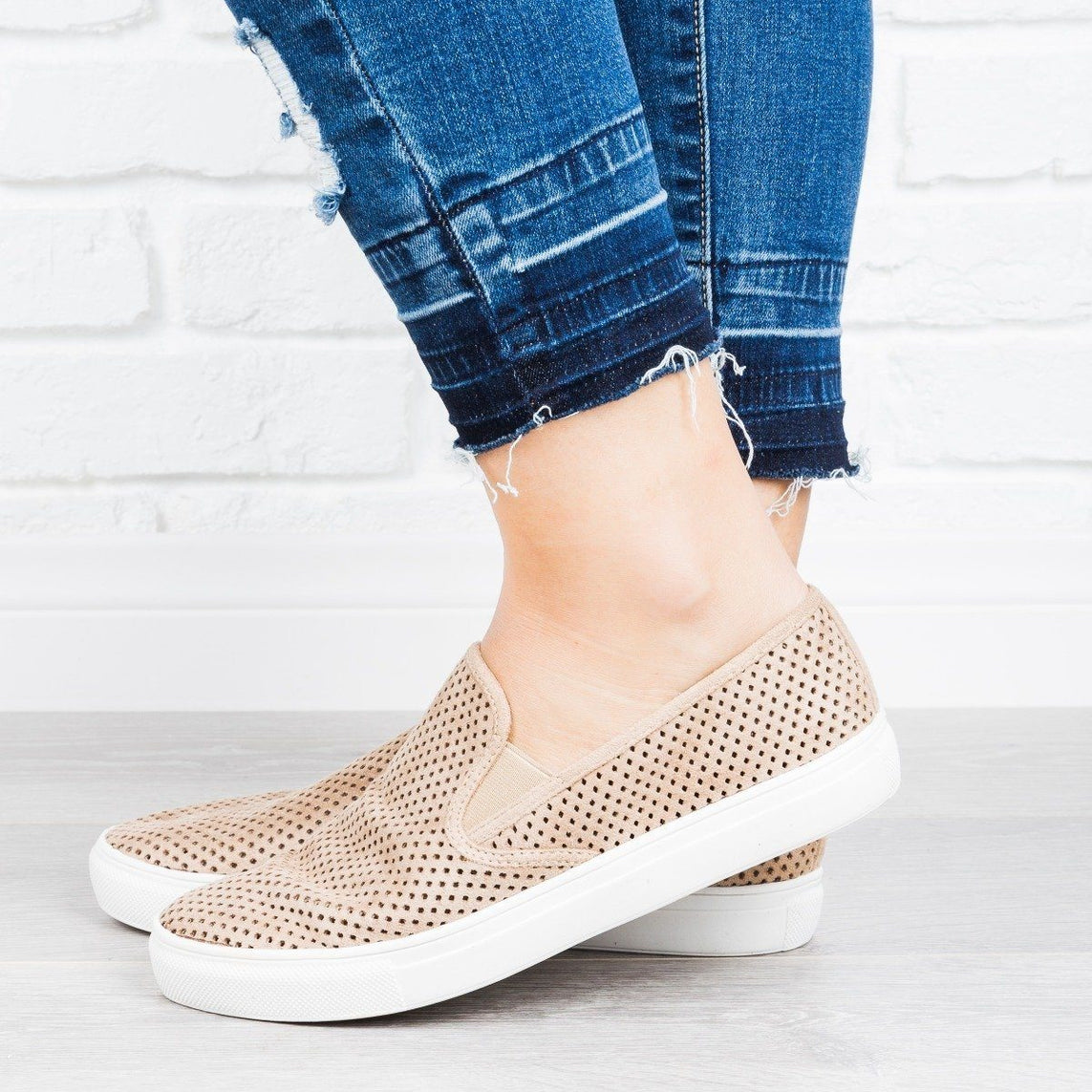 women's perforated slip on sneakers