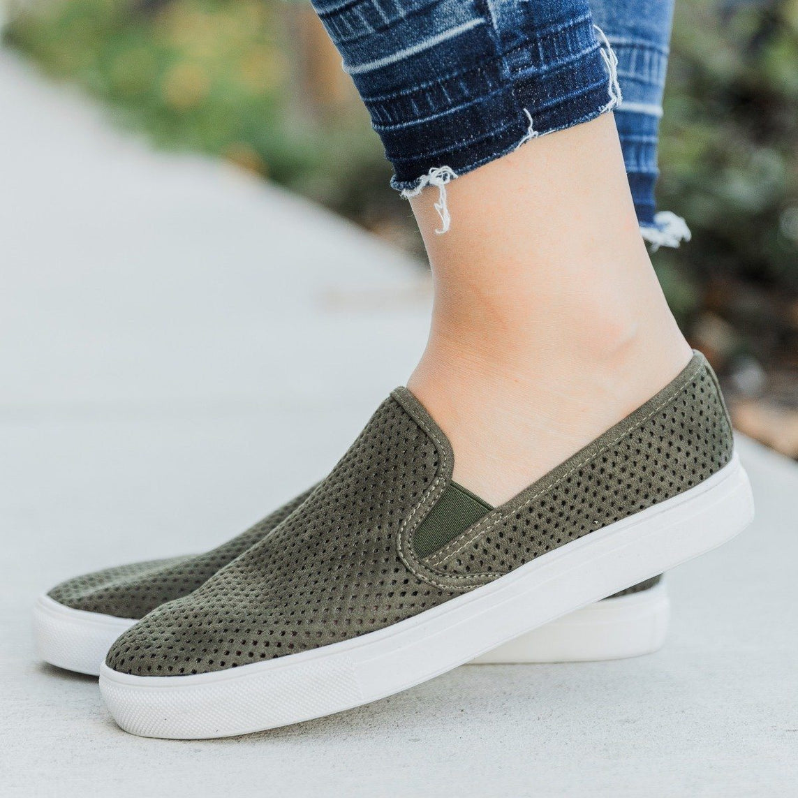 women's perforated slip on sneakers