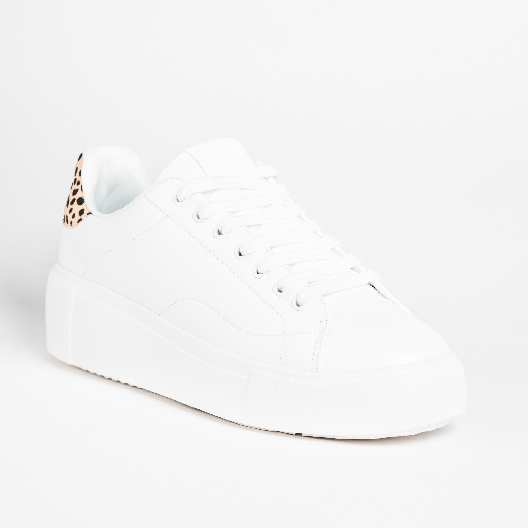 white sneakers with cheetah print
