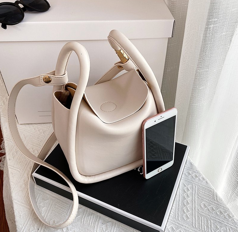 spacious handbag color beige small for women