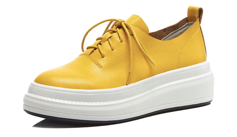 leather sneaker color yellow size 4.5 for women
