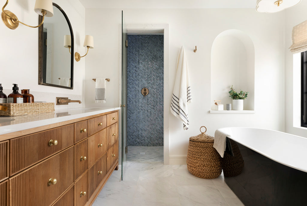 Neutral Bathroom with Wooden Cabinetry and Brass Handles
