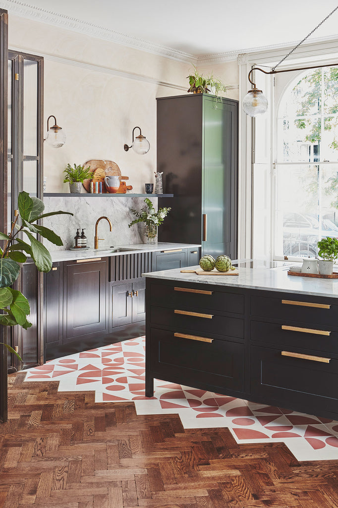 Kitchen with Black Island and Red Accents 