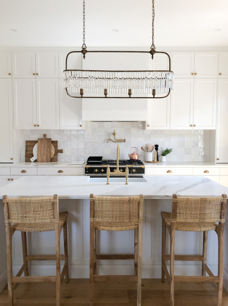 White Kitchen with island and barstools