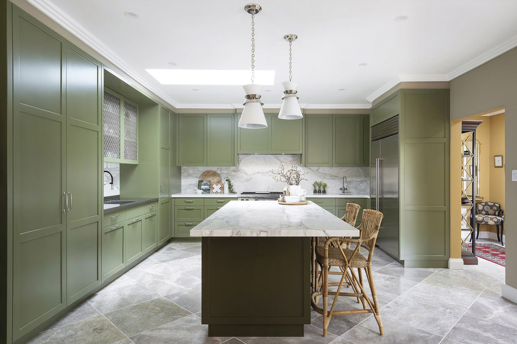 Green Kitchen with Marble Worktop and Wicker Chairs