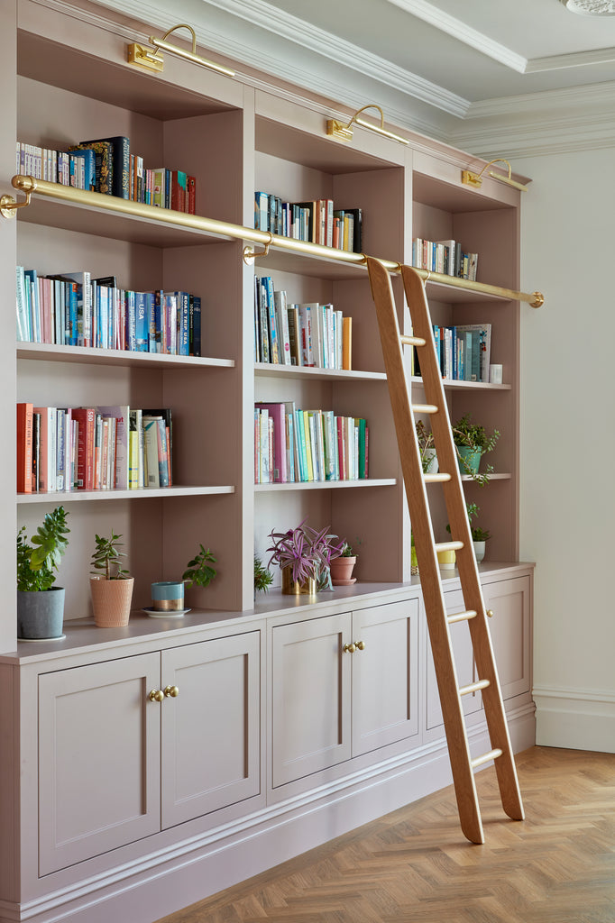 Pink Cabinet with Bookshelves and Brass Handles