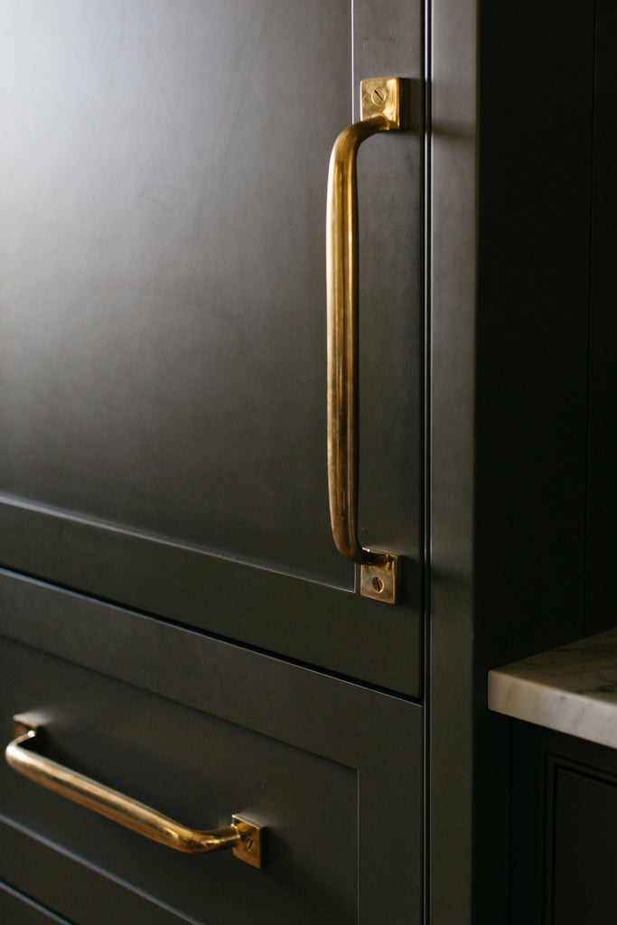 kater marker interiors close up cabinet handles polished brass