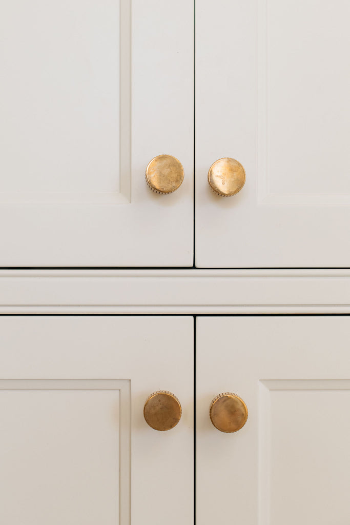 kate marker close up cabinet hardware polished brass knobs