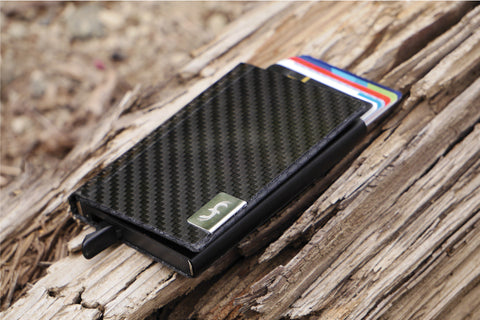 Common Fibers carbon fiber card slider wallet with cards fanned out