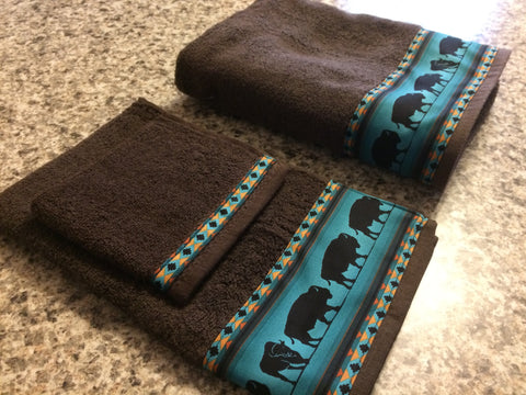 teal and brown towels