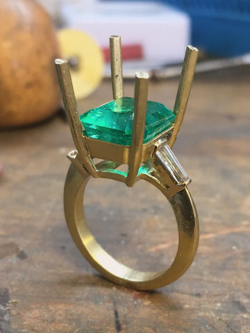 FG-VS tapered baguette diamonds set and prongs ready to receive the emerald
