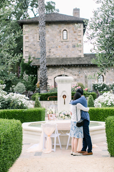 couple hugging after engagement