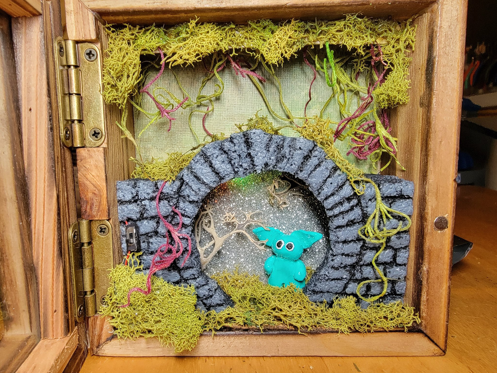Miniature gremlin in a moongate world