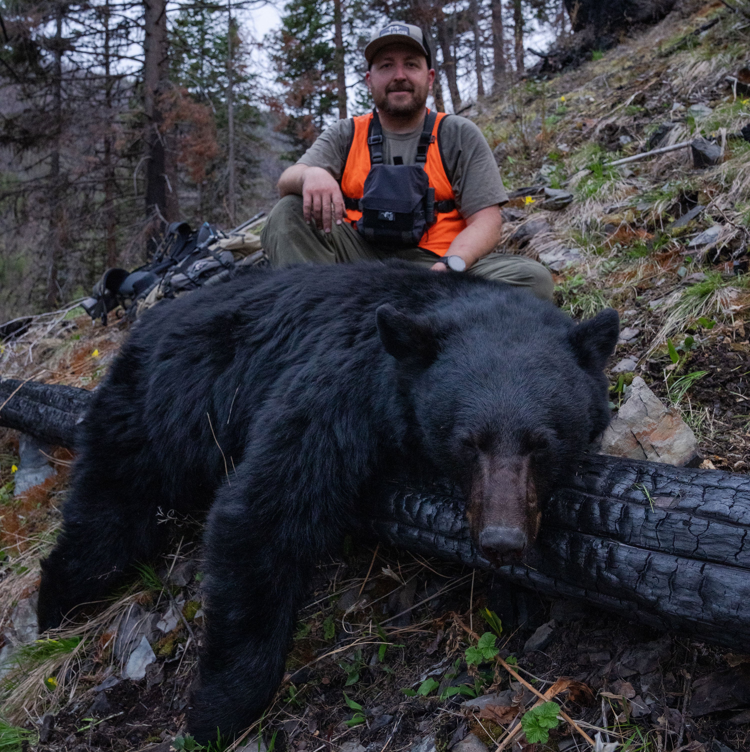 Hunter with black bear