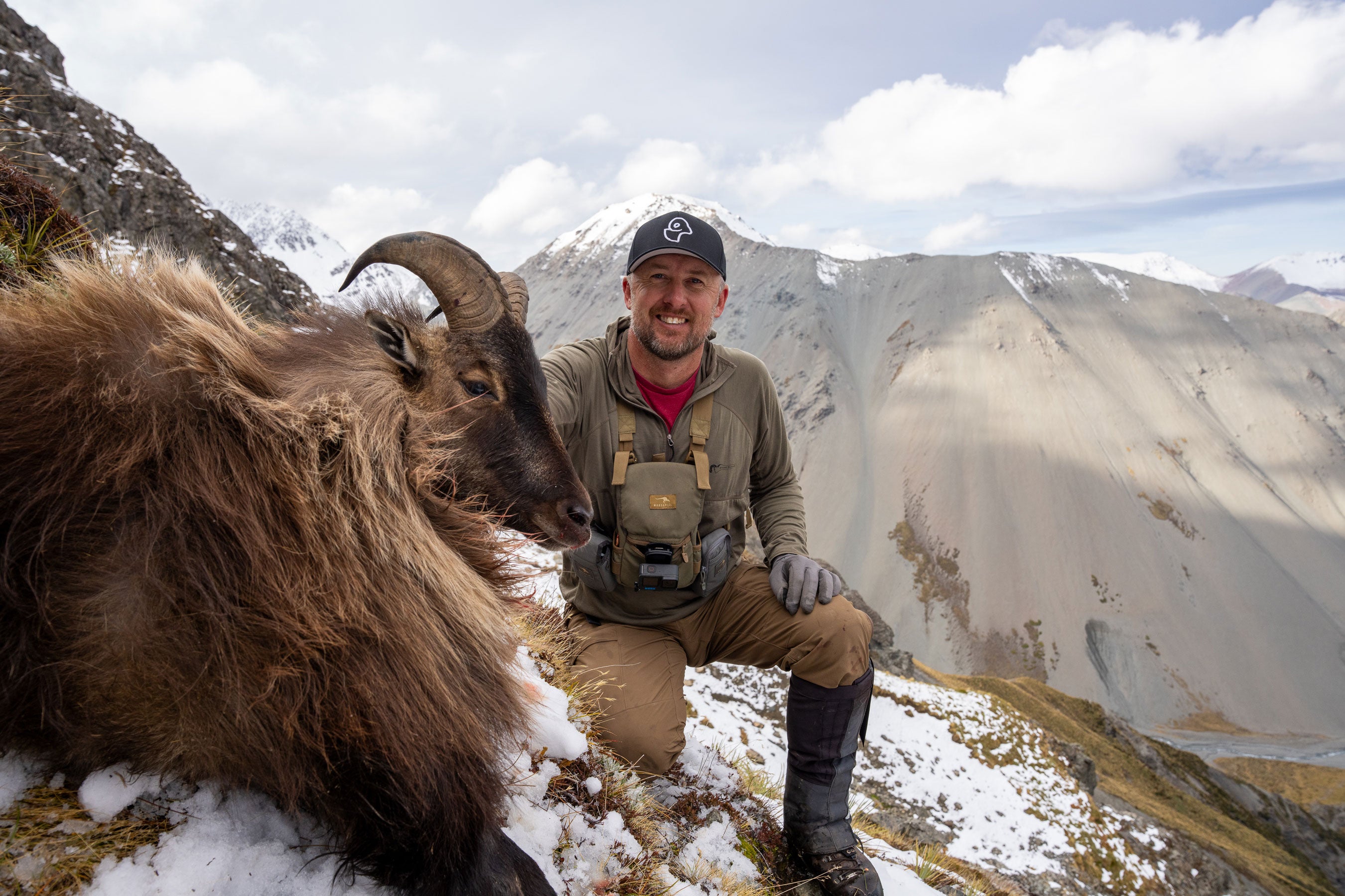 Hunter with tahr