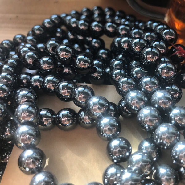 Hematite provides a protective grounding energy that evokes deep memory & thought. With all the traveling & work we do, it's comforting to keep this gem around us for extra stability.