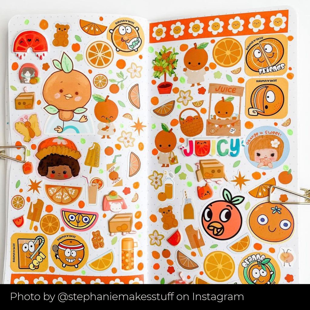 A scrapbook page with an orange theme