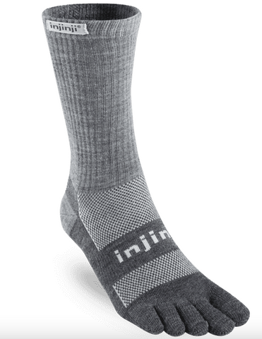 toe sock in crew length with multiple shades of gray throughout