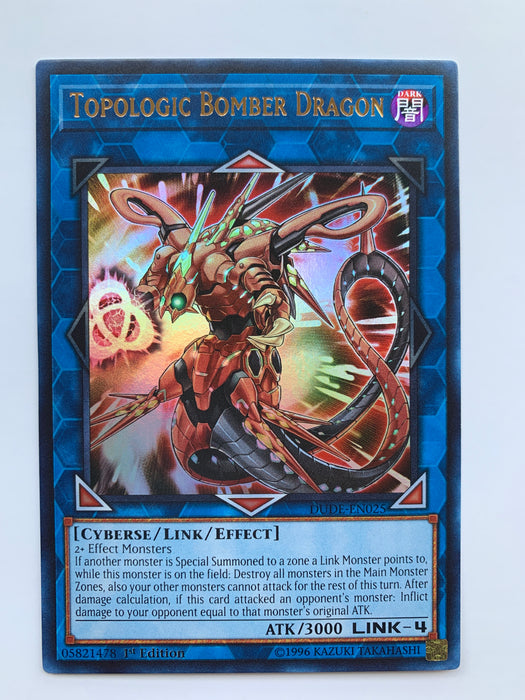 Topologic Bomber Dragon Dude En025 Ultra 1st — Transcend Cards