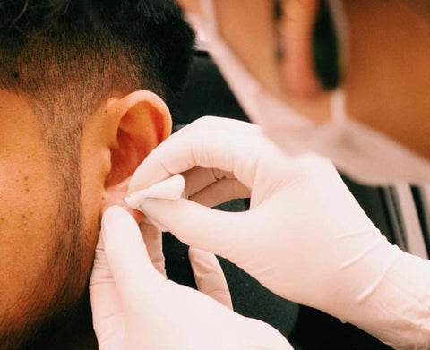 Infected Ear Piercing: Symptoms, Treatment & Prevention