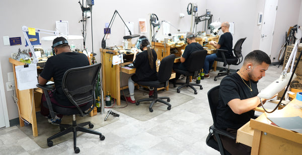 Automic Gold jewelers handcrafting our solid gold jewelry in our New York City studio