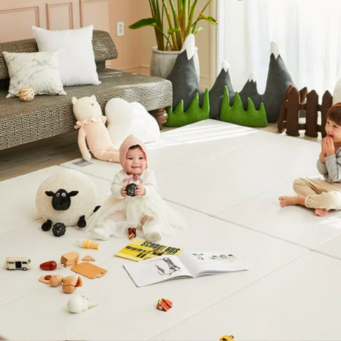 Infant Playing on Non-Toxic Playmat