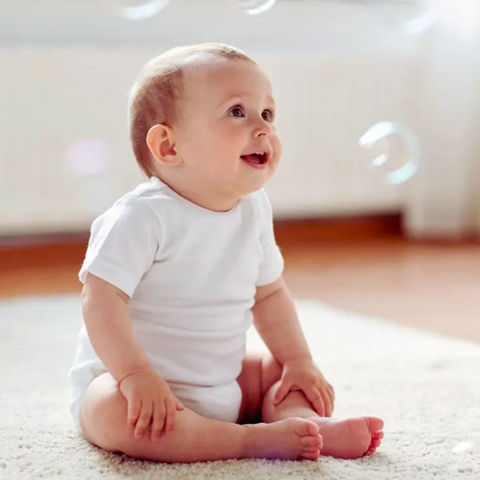 Infant Fascinated with the Bubble Floating