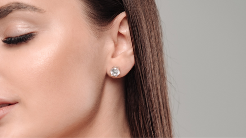 Silver stud earrings with diamonds