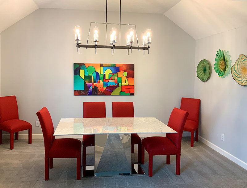 Sally Trace artwork hanging in a modern contemporary dining room