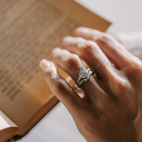 engagement ring on finger