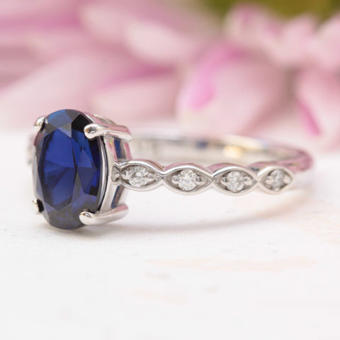 ethical handcrafted blue sapphire and diamond engagement ring