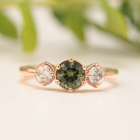 green sapphire and diamond engagement ring