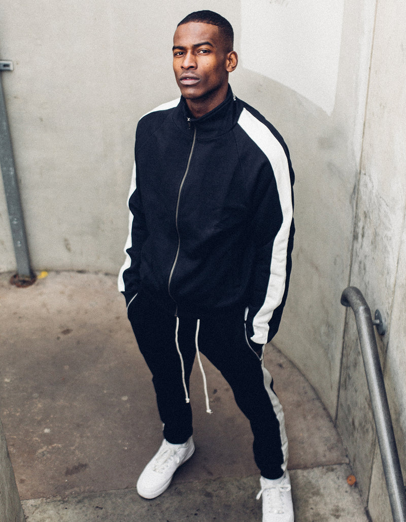 black tracksuit white stripe