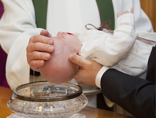 marraine et parrain lors du baptême