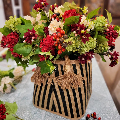 fake Christmas flowers in a basket
