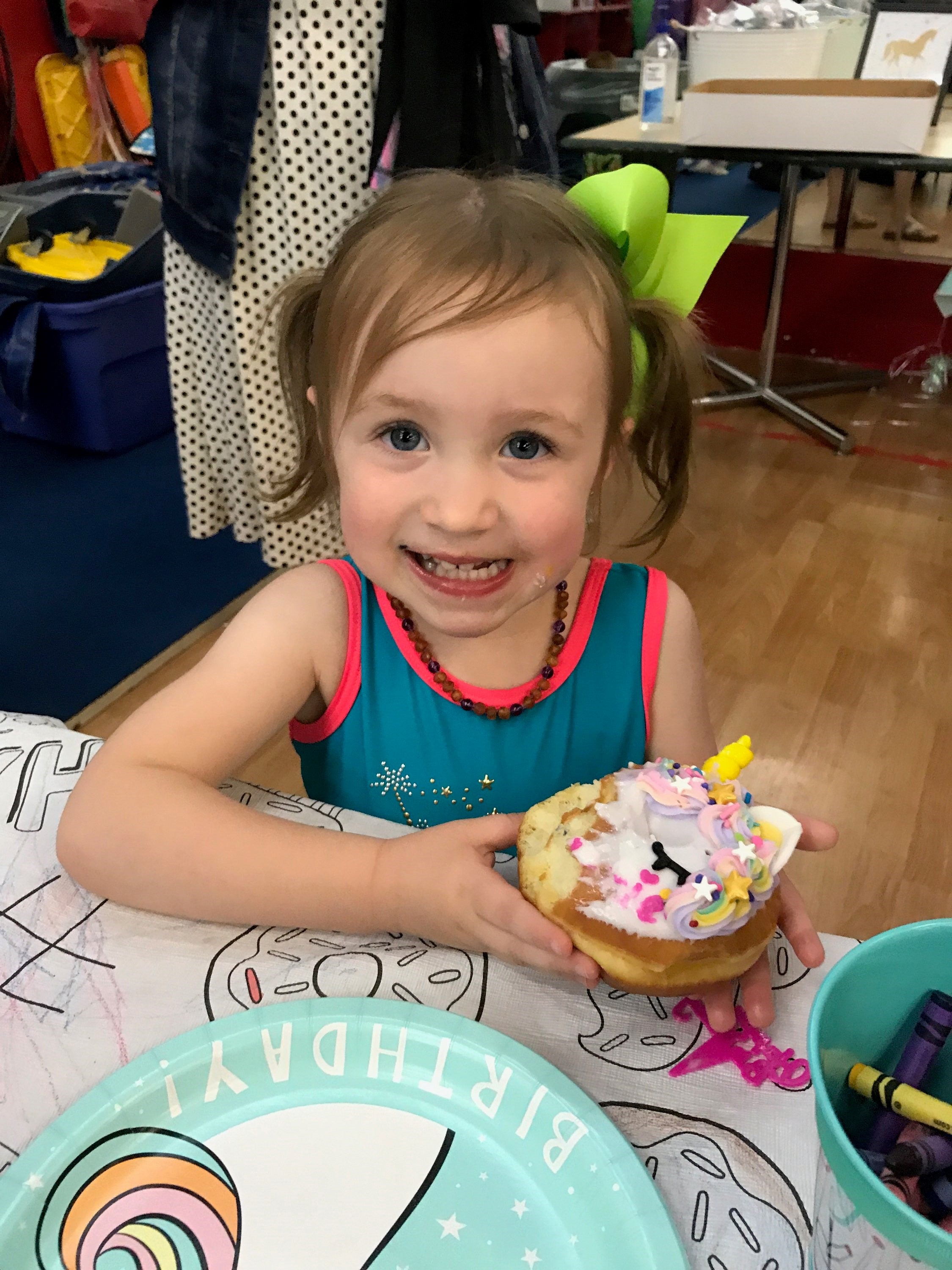 Macie Grace at the Gym enjoying a cupcake for a birthday